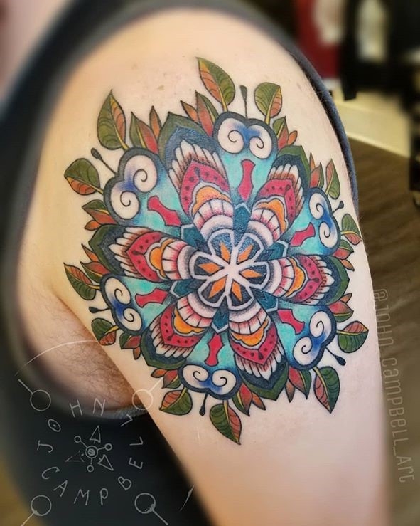 Insanely beautiful colored mandala tattoo done by John Campbell of Sacred Mandala Studio. Book your next custom tattoo in North Carolina at Sacred Mandala Studio Art Gallery and Tattoo Parlor.