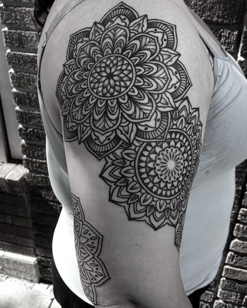 Yet another example of incredibly mandala work by Alan Lott at Sacred Mandala Studio in Durham, NC. Black and grey mandala tattoo - upper arm and shoulder.