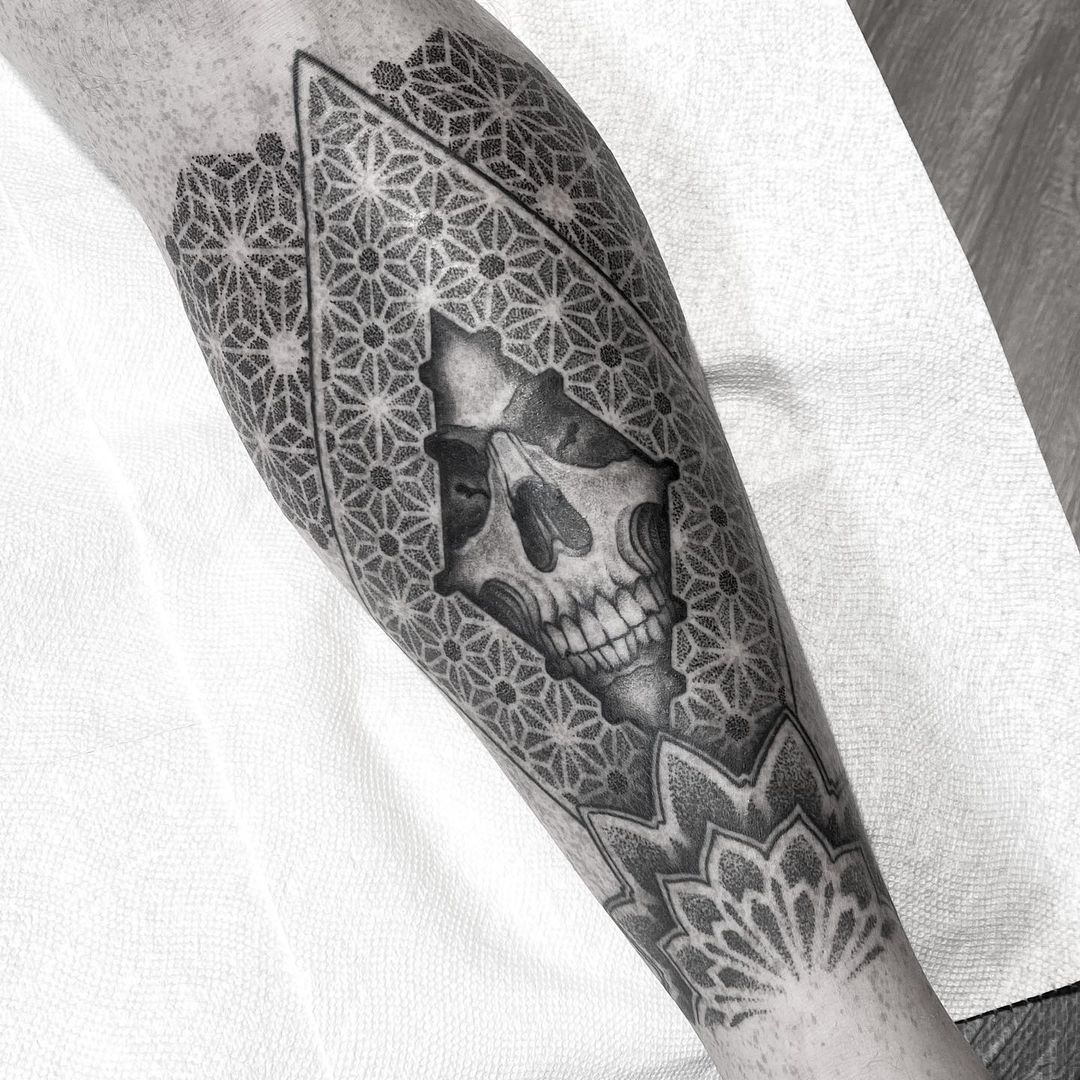 Black and grey skull surrounded by mandala dot work - crazy intricate work by tattoo artist Alan Lott at Sacred Mandala Studio in Durham, NC