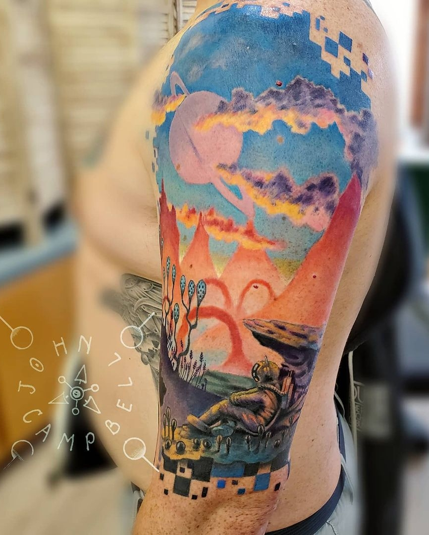 John Campbell - Tattoo artist for Sacred Mandala Studio - Tattoo Parlor and Art Gallery in Durham, NC. John works in mediums: tattoos, paint, sculpture, digital & graphic design